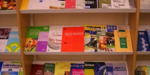 Photo of journals on a bookshelf