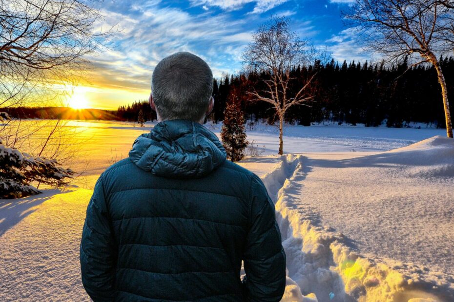 Man watching a snowy landscape
