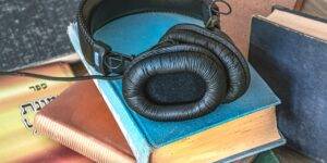 Picture of headphones on a stack of books